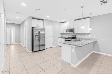 Welcome to a beautifully maintained townhome located in the on Gateway Golf and Country Club in Florida - for sale on GolfHomes.com, golf home, golf lot