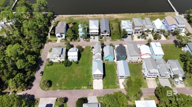 Looking to build your dream home?  Welcome to this beautiful lot on Peninsula Golf and Racquet Club in Alabama - for sale on GolfHomes.com, golf home, golf lot