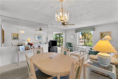 Don't miss this 2-bed, 2-bath condominium in the private on Miles Grant Country Club in Florida - for sale on GolfHomes.com, golf home, golf lot