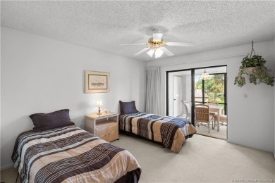 Don't miss this 2-bed, 2-bath condominium in the private on Miles Grant Country Club in Florida - for sale on GolfHomes.com, golf home, golf lot