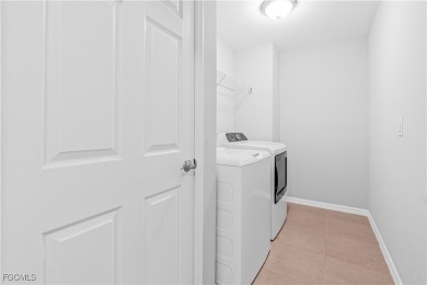 Welcome to a beautifully maintained townhome located in the on Gateway Golf and Country Club in Florida - for sale on GolfHomes.com, golf home, golf lot