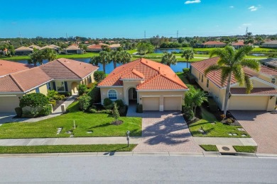 Discover the epitome of country club living in this stunning on Venetian Golf and River Club in Florida - for sale on GolfHomes.com, golf home, golf lot