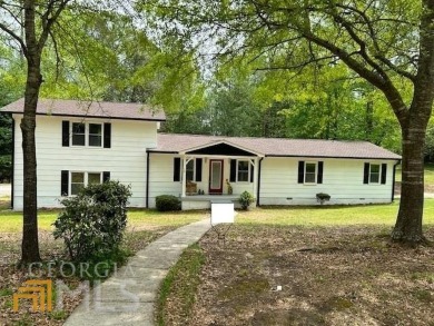 THIS ONE HAS 2 SEPARATE FULL KITCHENS / Mother in Laws Suite / on Newnan Country Club in Georgia - for sale on GolfHomes.com, golf home, golf lot