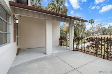 This beautifully remodeled home is right in the HEART of golf on Plantation Inn and Golf Resort  in Florida - for sale on GolfHomes.com, golf home, golf lot