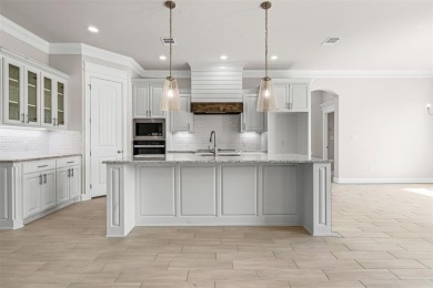 Welcome to luxury living in the prestigious, gated community of on Pecan Plantation Country Club in Texas - for sale on GolfHomes.com, golf home, golf lot