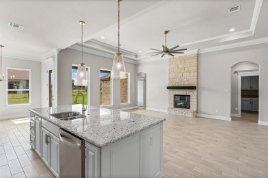 Welcome to luxury living in the prestigious, gated community of on Pecan Plantation Country Club in Texas - for sale on GolfHomes.com, golf home, golf lot