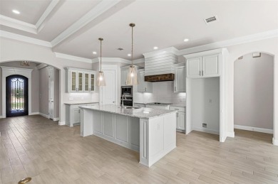Welcome to luxury living in the prestigious, gated community of on Pecan Plantation Country Club in Texas - for sale on GolfHomes.com, golf home, golf lot