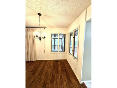Step into this adorable home in Hot Springs Village! This home on DeSoto Golf Course in Arkansas - for sale on GolfHomes.com, golf home, golf lot