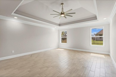 Welcome to luxury living in the prestigious, gated community of on Pecan Plantation Country Club in Texas - for sale on GolfHomes.com, golf home, golf lot