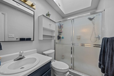 Perfectly tucked inside a quiet cul-de-sac, this move-in ready on Hedingham Golf and Athletic Club in North Carolina - for sale on GolfHomes.com, golf home, golf lot