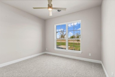 Welcome to luxury living in the prestigious, gated community of on Pecan Plantation Country Club in Texas - for sale on GolfHomes.com, golf home, golf lot