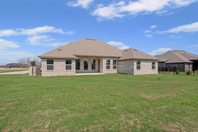 Welcome to luxury living in the prestigious, gated community of on Pecan Plantation Country Club in Texas - for sale on GolfHomes.com, golf home, golf lot