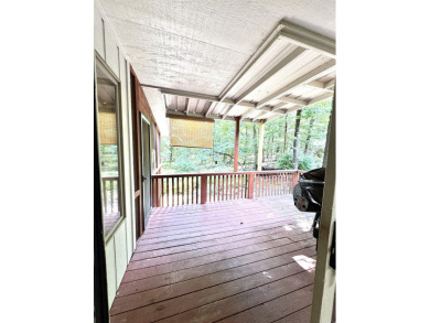 Step into this adorable home in Hot Springs Village! This home on DeSoto Golf Course in Arkansas - for sale on GolfHomes.com, golf home, golf lot
