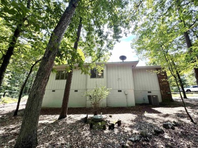 Step into this adorable home in Hot Springs Village! This home on DeSoto Golf Course in Arkansas - for sale on GolfHomes.com, golf home, golf lot