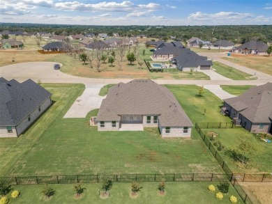 Welcome to luxury living in the prestigious, gated community of on Pecan Plantation Country Club in Texas - for sale on GolfHomes.com, golf home, golf lot