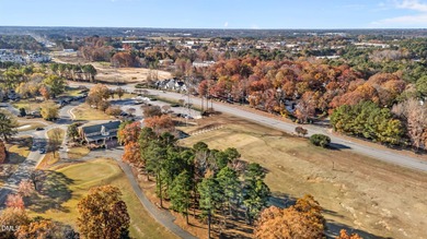 Perfectly tucked inside a quiet cul-de-sac, this move-in ready on Hedingham Golf and Athletic Club in North Carolina - for sale on GolfHomes.com, golf home, golf lot