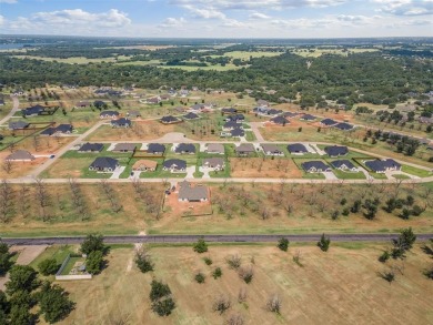 Welcome to luxury living in the prestigious, gated community of on Pecan Plantation Country Club in Texas - for sale on GolfHomes.com, golf home, golf lot