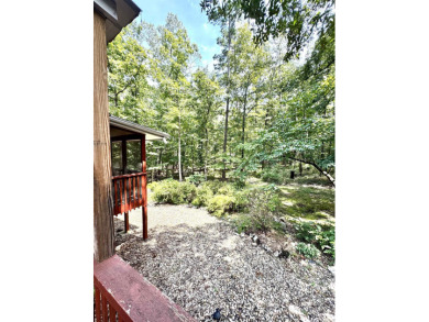Step into this adorable home in Hot Springs Village! This home on DeSoto Golf Course in Arkansas - for sale on GolfHomes.com, golf home, golf lot
