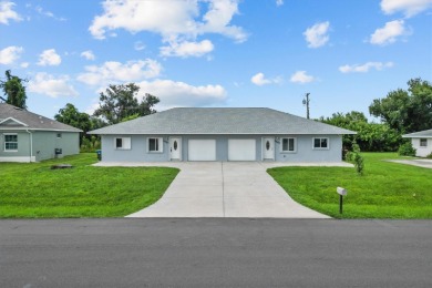 Investment Opportunity in Englewood! This 2003-built duplex at on Oyster Creek Golf Club in Florida - for sale on GolfHomes.com, golf home, golf lot
