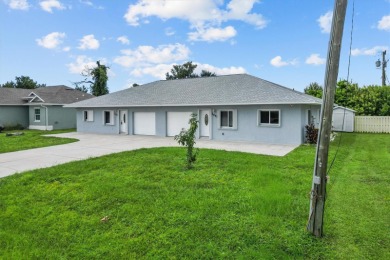 Investment Opportunity in Englewood! This 2003-built duplex at on Oyster Creek Golf Club in Florida - for sale on GolfHomes.com, golf home, golf lot