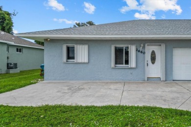 Investment Opportunity in Englewood! This 2003-built duplex at on Oyster Creek Golf Club in Florida - for sale on GolfHomes.com, golf home, golf lot