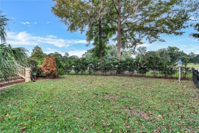 Classic 4 bedroom 3 1/2 bath Belfair home overlooking lagoon to on Belfair Golf Club in South Carolina - for sale on GolfHomes.com, golf home, golf lot