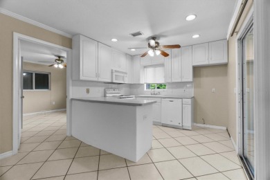 Investment Opportunity in Englewood! This 2003-built duplex at on Oyster Creek Golf Club in Florida - for sale on GolfHomes.com, golf home, golf lot