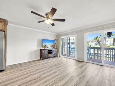 Welcome to your cozy coastal cottage on the canal at Sandpiper on Sandpiper Cove Golf Course in Florida - for sale on GolfHomes.com, golf home, golf lot