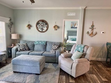 Welcome home to this impeccable 2-bedroom 2-bath sanctuary on Cypresswood Golf and Country Club in Florida - for sale on GolfHomes.com, golf home, golf lot