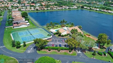 Spacious Gated two bedrooms, two bath single family home with a on Cypress Creek Country Club - Boynton Beach in Florida - for sale on GolfHomes.com, golf home, golf lot