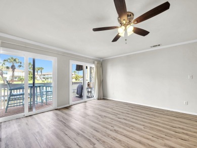 Welcome to your cozy coastal cottage on the canal at Sandpiper on Sandpiper Cove Golf Course in Florida - for sale on GolfHomes.com, golf home, golf lot
