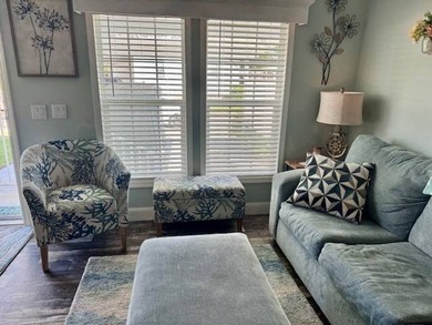 Welcome home to this impeccable 2-bedroom 2-bath sanctuary on Cypresswood Golf and Country Club in Florida - for sale on GolfHomes.com, golf home, golf lot