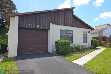 Spacious Gated two bedrooms, two bath single family home with a on Cypress Creek Country Club - Boynton Beach in Florida - for sale on GolfHomes.com, golf home, golf lot