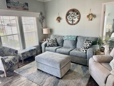 Welcome home to this impeccable 2-bedroom 2-bath sanctuary on Cypresswood Golf and Country Club in Florida - for sale on GolfHomes.com, golf home, golf lot