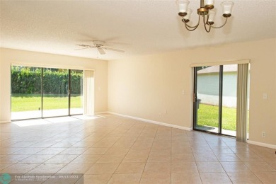 Spacious Gated two bedrooms, two bath single family home with a on Cypress Creek Country Club - Boynton Beach in Florida - for sale on GolfHomes.com, golf home, golf lot