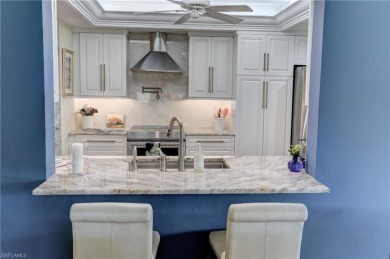 Elegant 1st floor corner condo with large lanai overlooking lake on Wyndemere Country Club in Florida - for sale on GolfHomes.com, golf home, golf lot