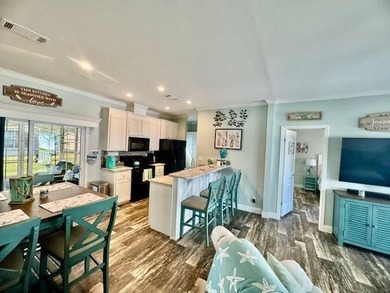 Welcome home to this impeccable 2-bedroom 2-bath sanctuary on Cypresswood Golf and Country Club in Florida - for sale on GolfHomes.com, golf home, golf lot