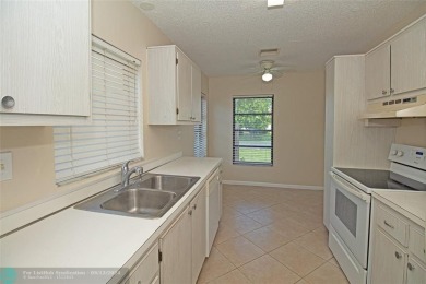 Spacious Gated two bedrooms, two bath single family home with a on Cypress Creek Country Club - Boynton Beach in Florida - for sale on GolfHomes.com, golf home, golf lot