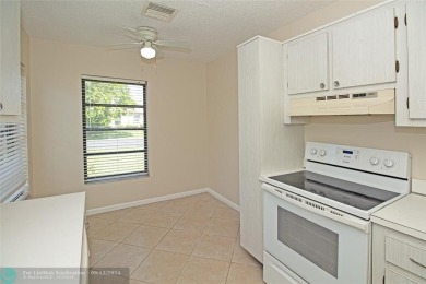 Spacious Gated two bedrooms, two bath single family home with a on Cypress Creek Country Club - Boynton Beach in Florida - for sale on GolfHomes.com, golf home, golf lot