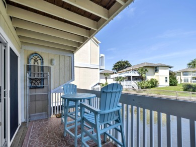 Welcome to your cozy coastal cottage on the canal at Sandpiper on Sandpiper Cove Golf Course in Florida - for sale on GolfHomes.com, golf home, golf lot