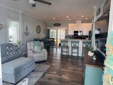 Welcome home to this impeccable 2-bedroom 2-bath sanctuary on Cypresswood Golf and Country Club in Florida - for sale on GolfHomes.com, golf home, golf lot