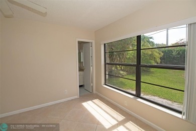 Spacious Gated two bedrooms, two bath single family home with a on Cypress Creek Country Club - Boynton Beach in Florida - for sale on GolfHomes.com, golf home, golf lot