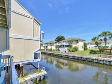 Welcome to your cozy coastal cottage on the canal at Sandpiper on Sandpiper Cove Golf Course in Florida - for sale on GolfHomes.com, golf home, golf lot