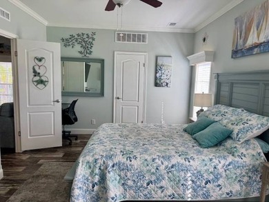 Welcome home to this impeccable 2-bedroom 2-bath sanctuary on Cypresswood Golf and Country Club in Florida - for sale on GolfHomes.com, golf home, golf lot