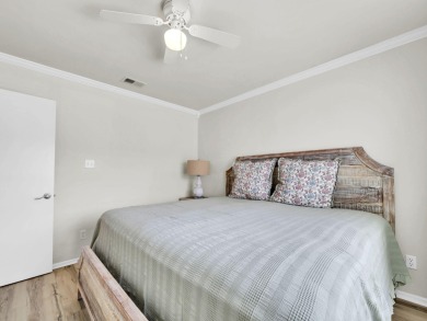 Welcome to your cozy coastal cottage on the canal at Sandpiper on Sandpiper Cove Golf Course in Florida - for sale on GolfHomes.com, golf home, golf lot