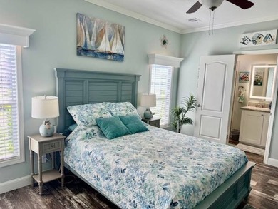 Welcome home to this impeccable 2-bedroom 2-bath sanctuary on Cypresswood Golf and Country Club in Florida - for sale on GolfHomes.com, golf home, golf lot