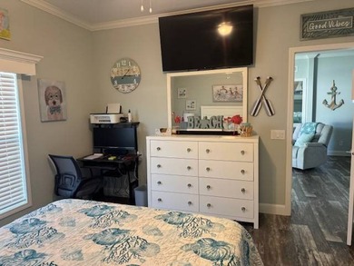 Welcome home to this impeccable 2-bedroom 2-bath sanctuary on Cypresswood Golf and Country Club in Florida - for sale on GolfHomes.com, golf home, golf lot