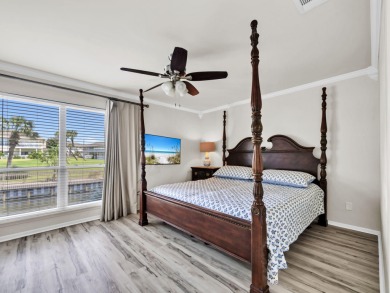 Welcome to your cozy coastal cottage on the canal at Sandpiper on Sandpiper Cove Golf Course in Florida - for sale on GolfHomes.com, golf home, golf lot