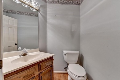 Nestled along the 5th fairway, this beautifully positioned home on Country Club of Roswell in Georgia - for sale on GolfHomes.com, golf home, golf lot