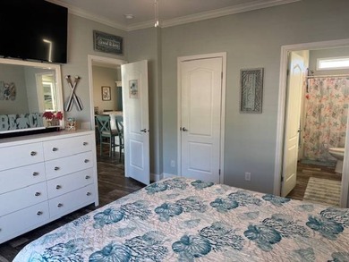 Welcome home to this impeccable 2-bedroom 2-bath sanctuary on Cypresswood Golf and Country Club in Florida - for sale on GolfHomes.com, golf home, golf lot